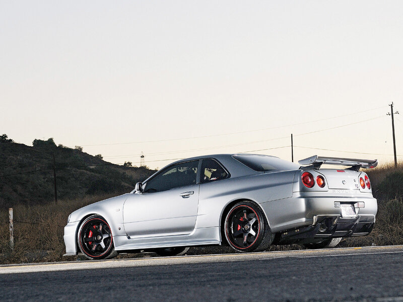 silver nissan skyline on road