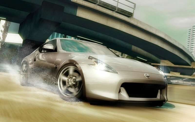 Silver Nissan sports car drifting