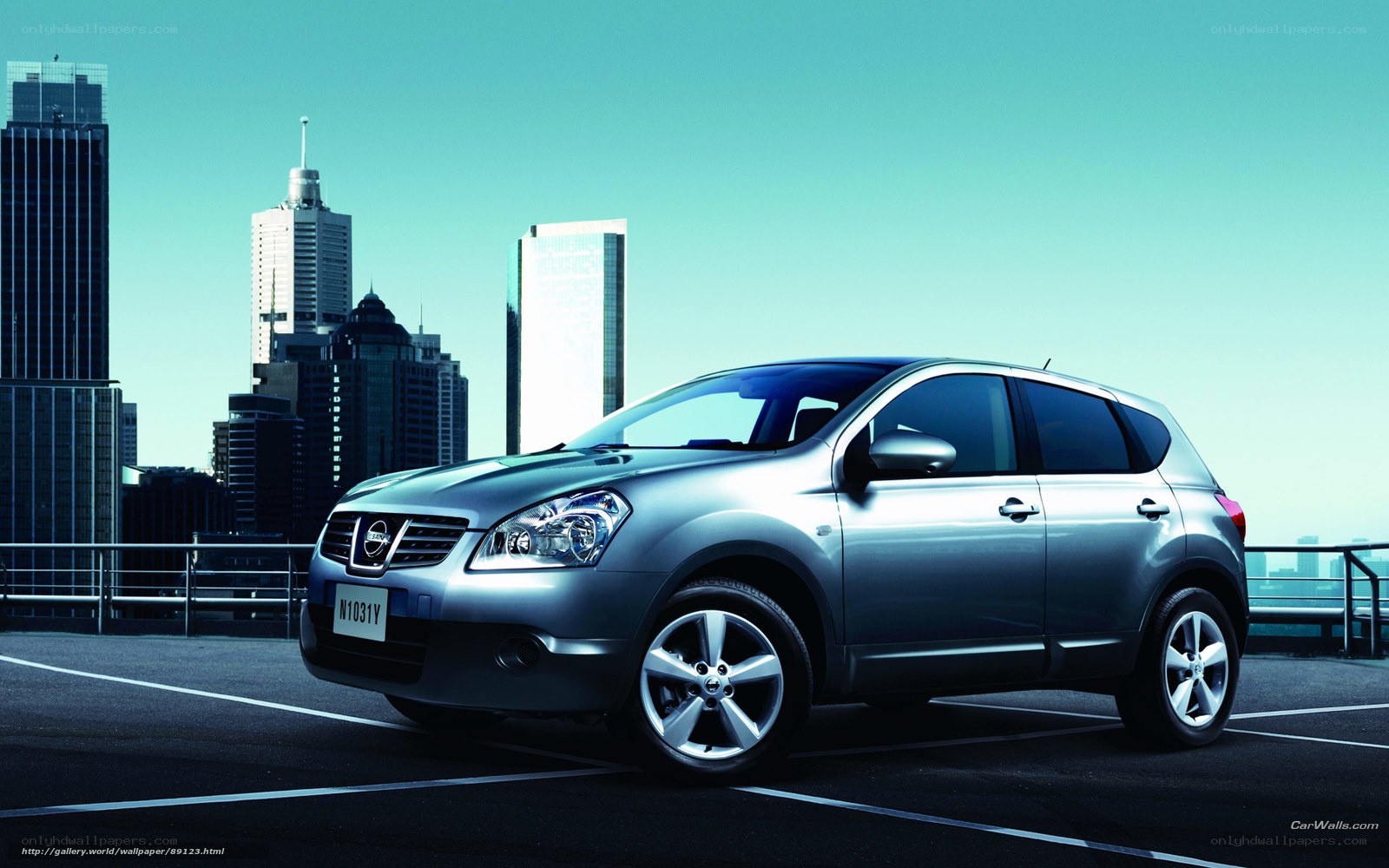 Silver Nissan SUV in city