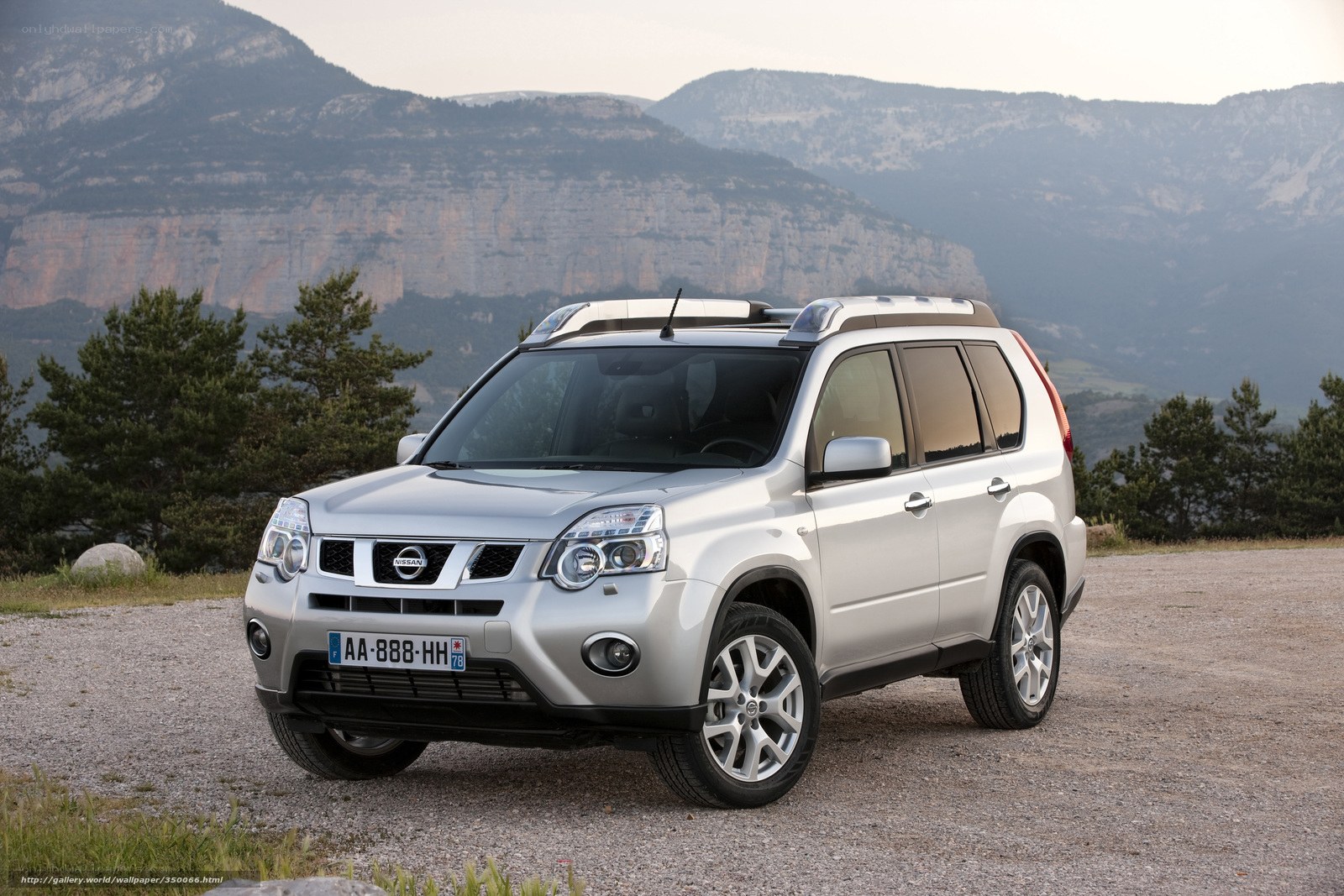Silver Nissan X-Trail in mountain setting