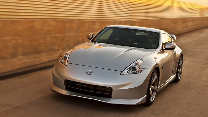 Silver Nissan Z driving on road
