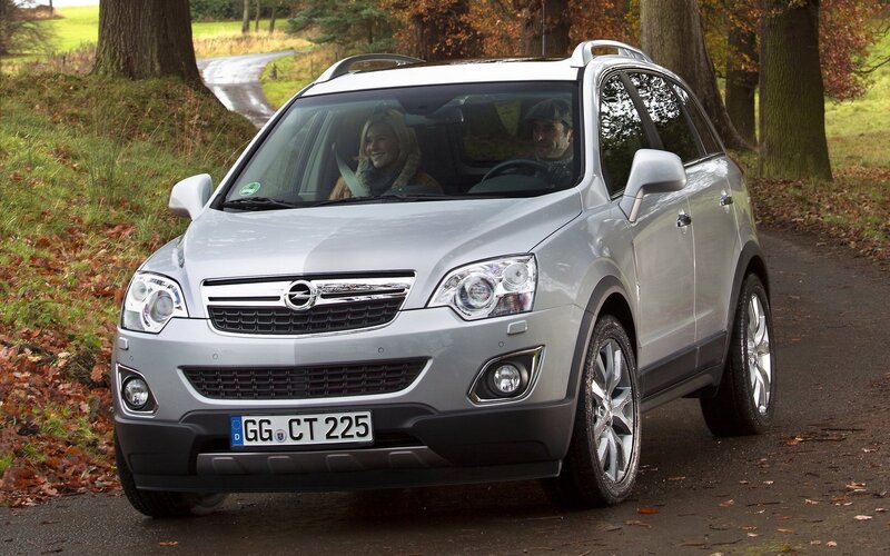 Silver Opel Antara on a country road