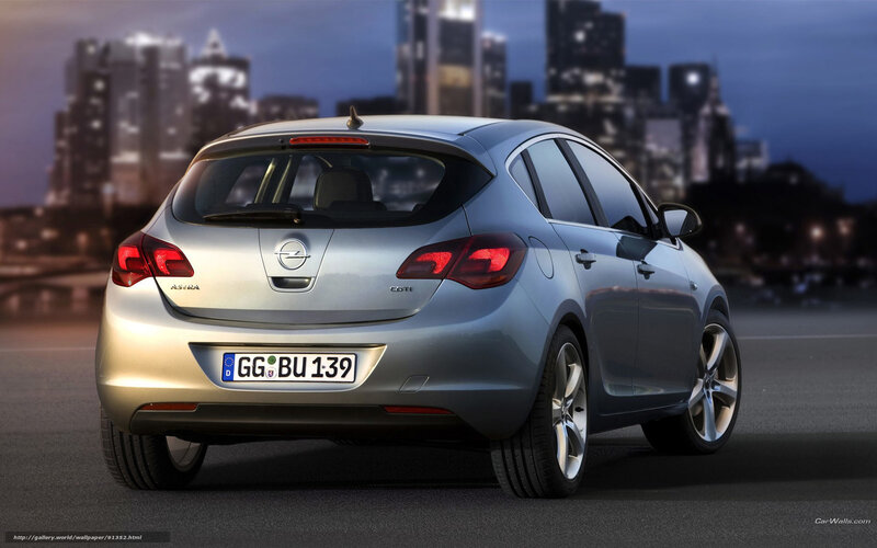 Silver Opel Astra Hatchback — Dramatic
