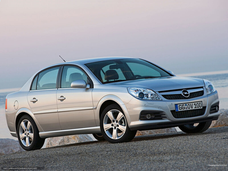 Silver Opel Astra Sedan — Serene