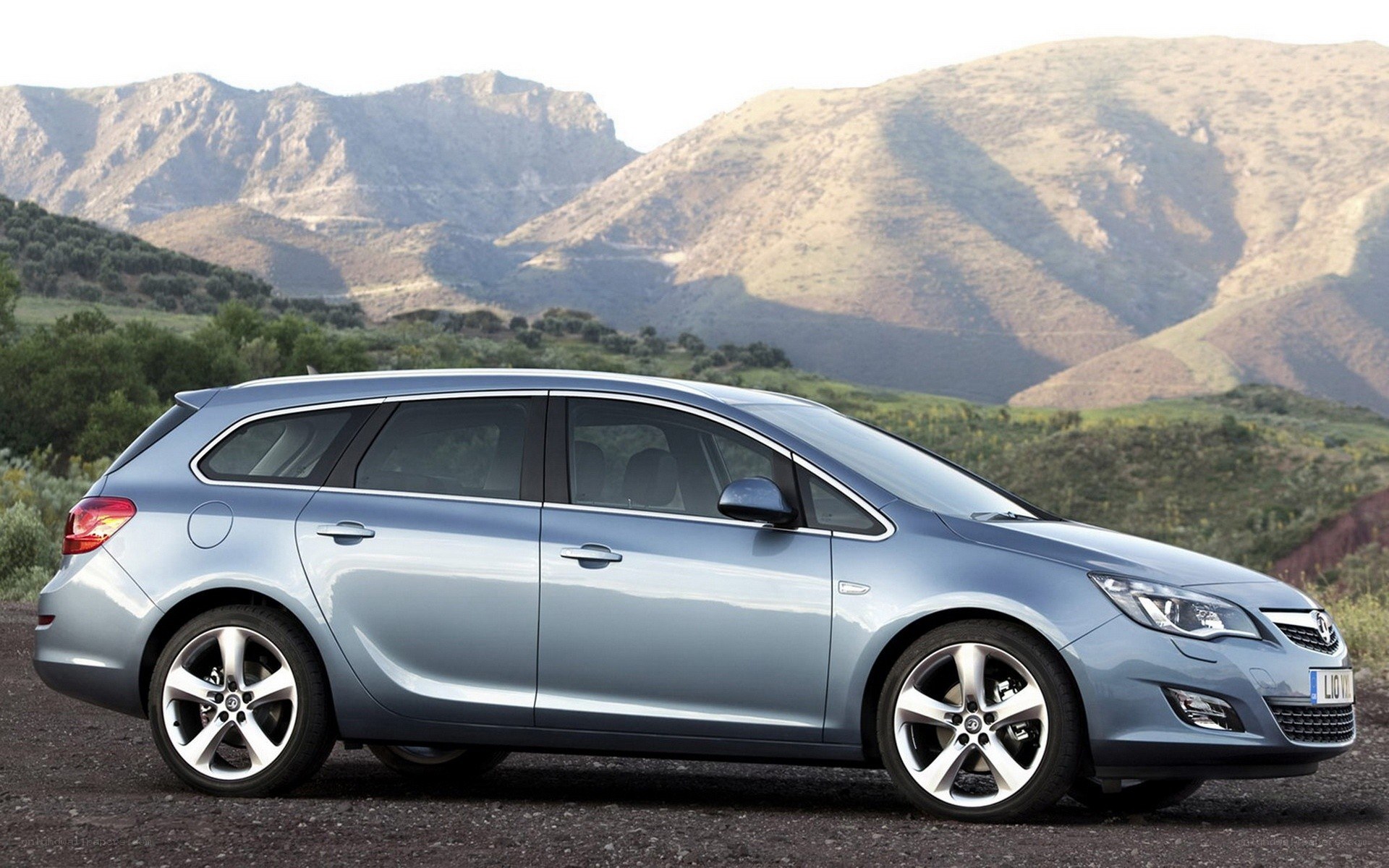 silver opel astra station wagon
