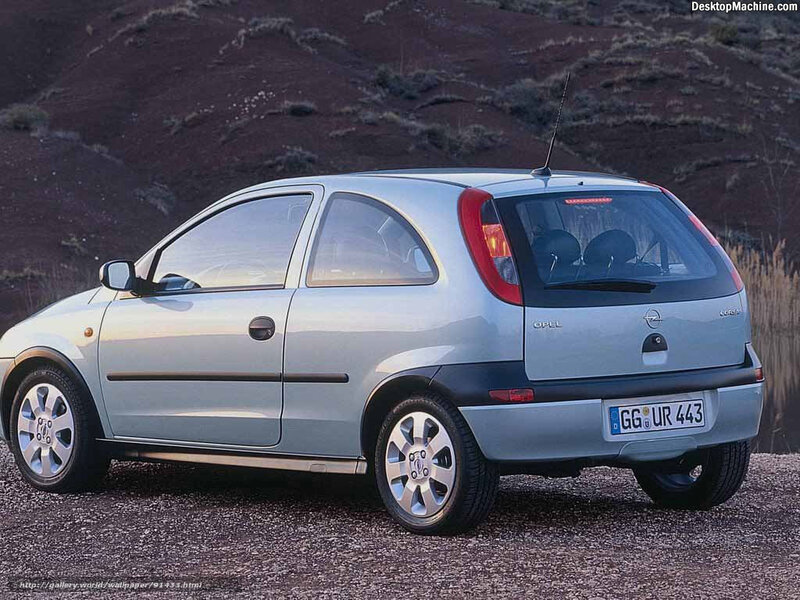 Silver Opel Corsa parked outdoors