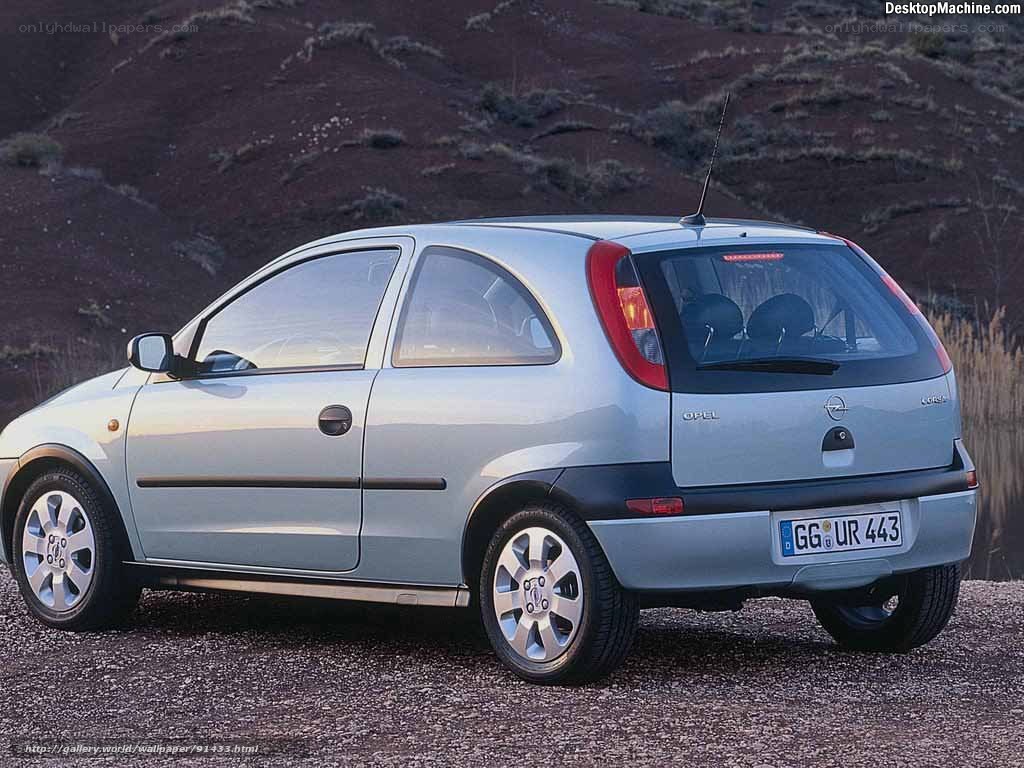 Silver Opel Corsa parked outdoors
