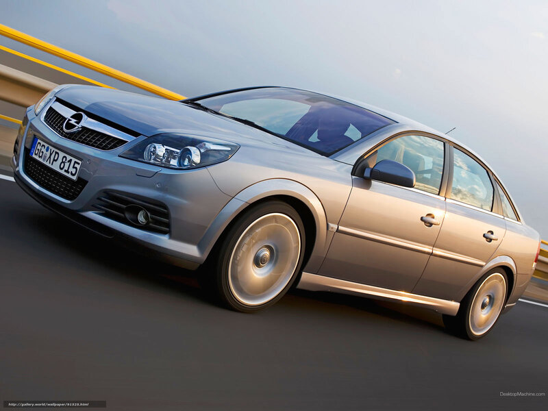 silver opel in motion