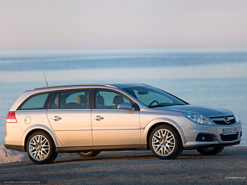 silver opel station wagon