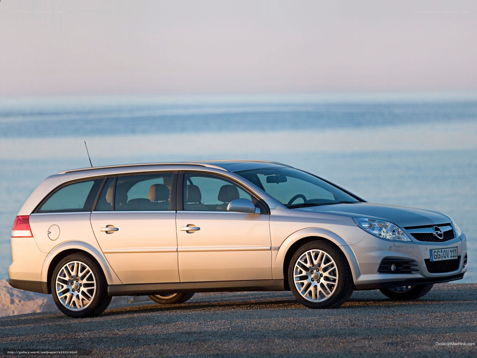 silver opel station wagon