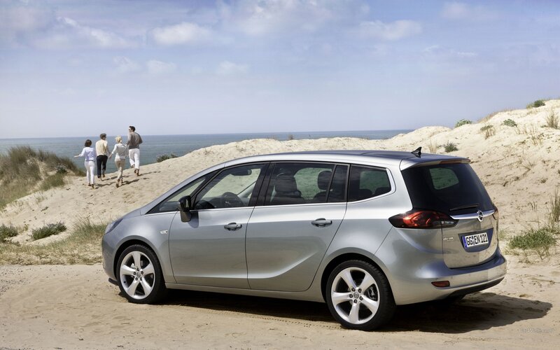 Silver Opel Zafira parked on beach