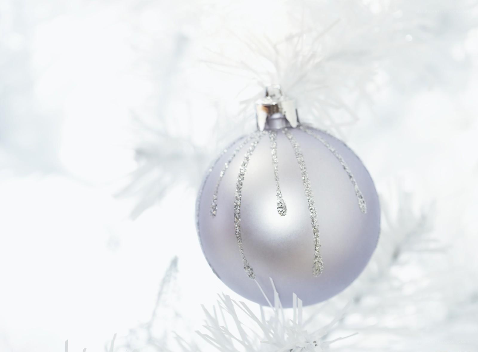 silver ornament on white tree