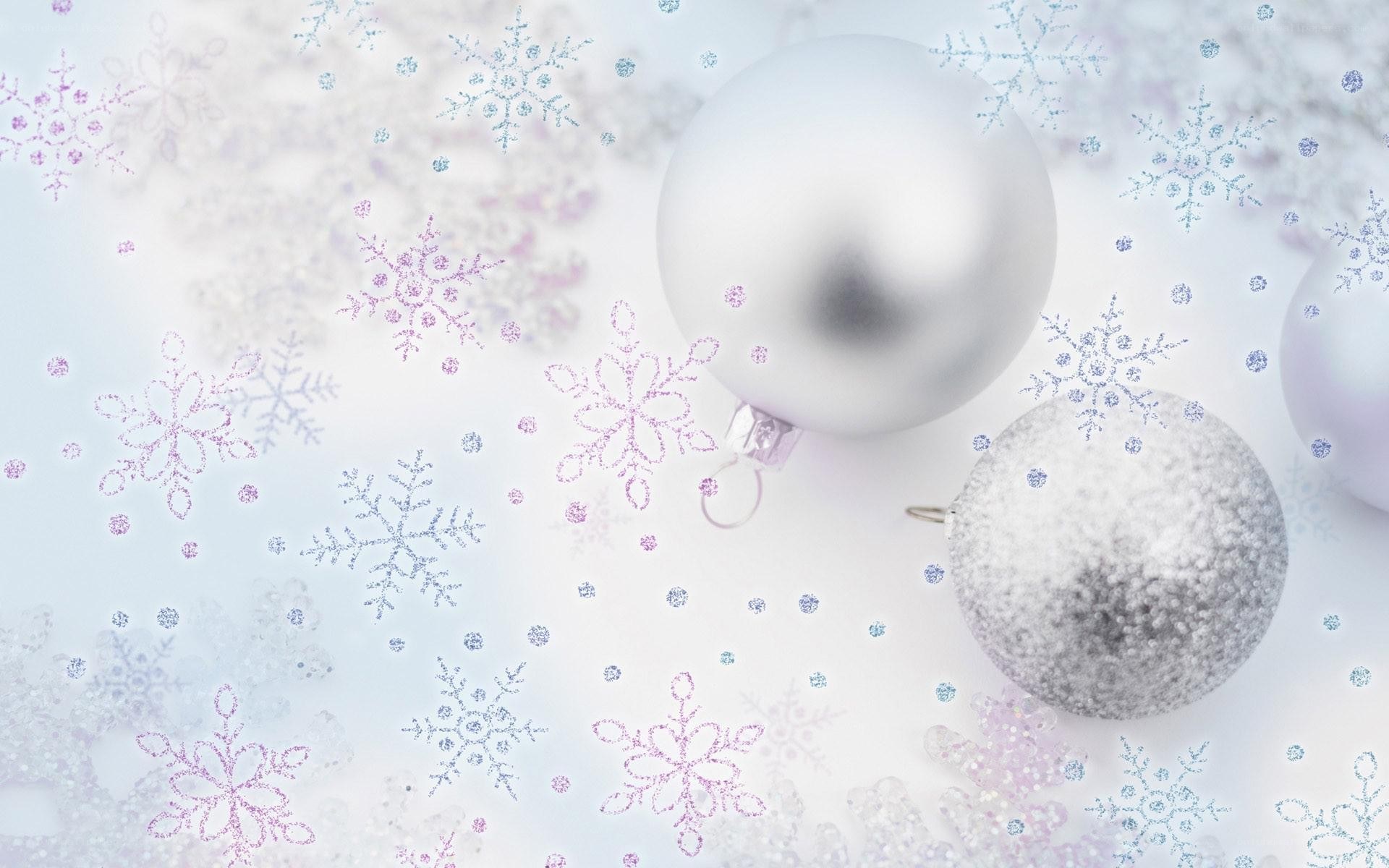 silver ornaments on snowflakes