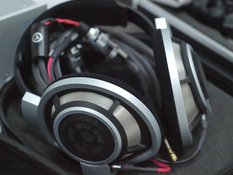 silver over-ear headphones