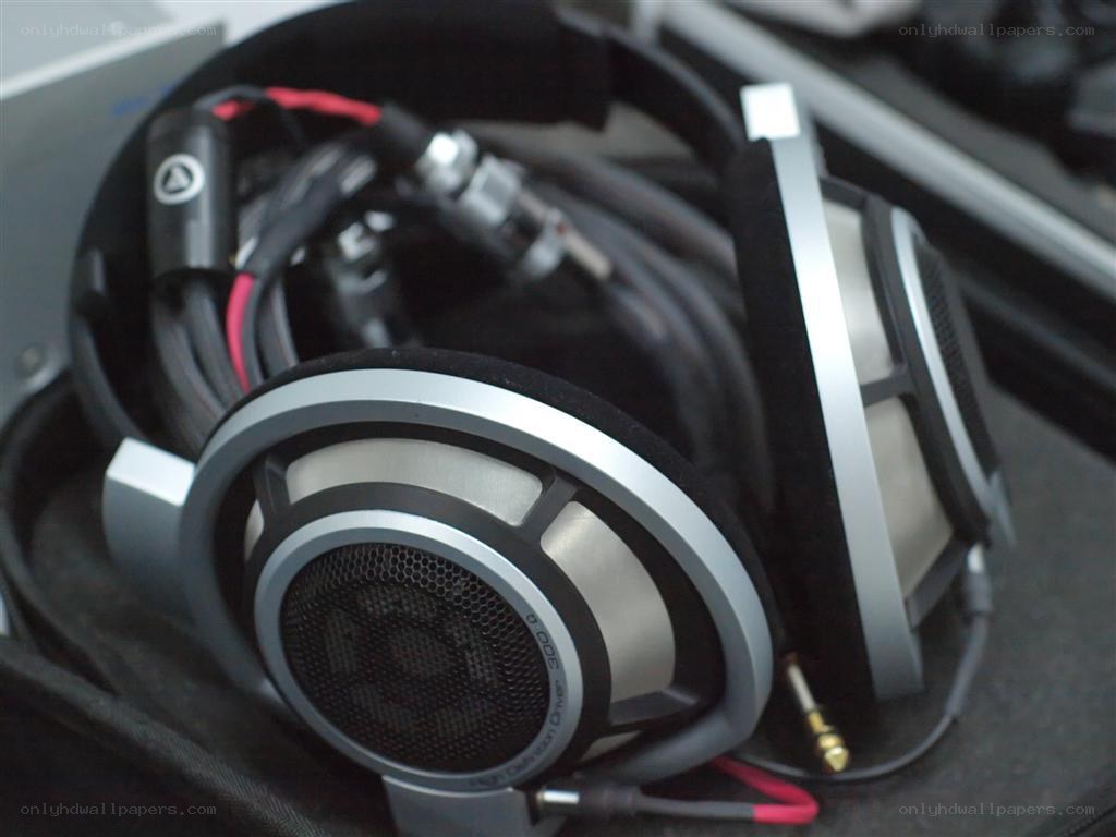 silver over-ear headphones