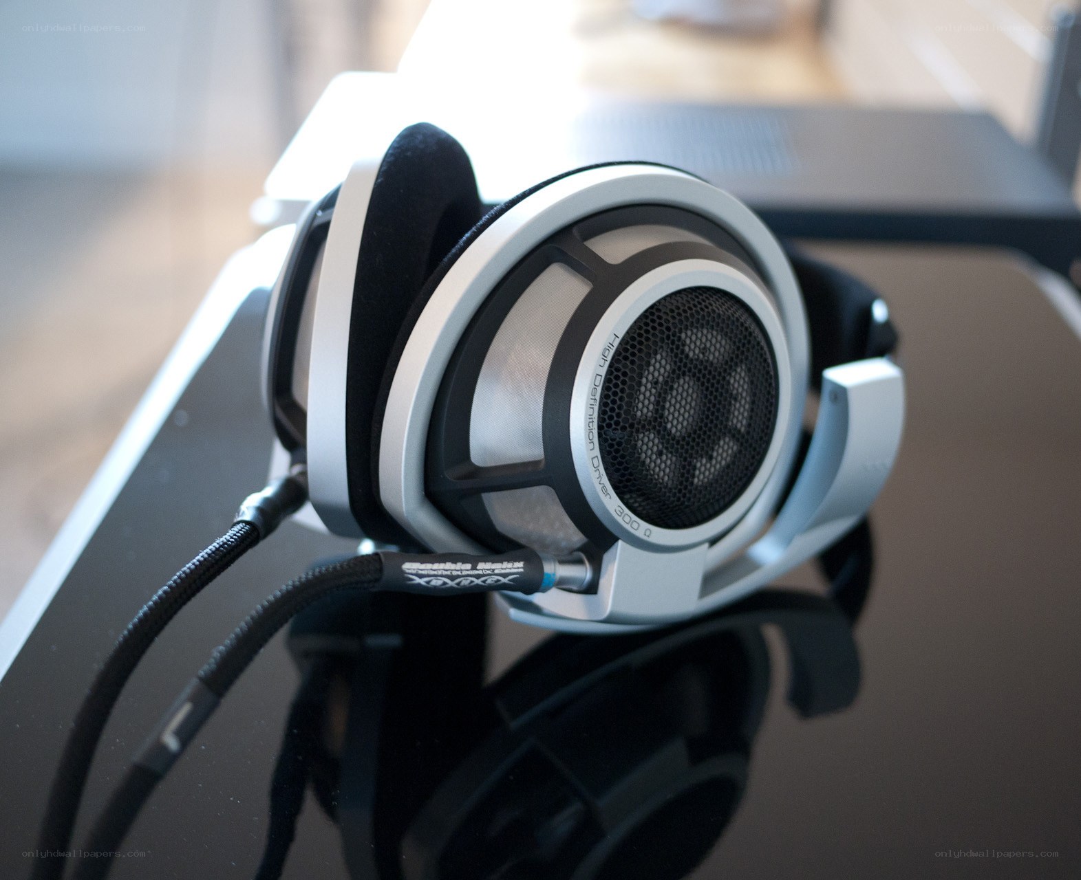 silver over-ear headphones