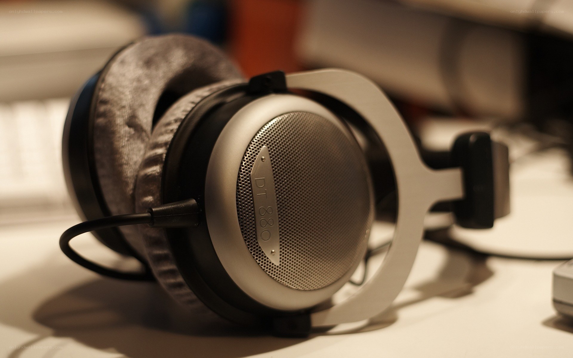 silver over-ear headphones
