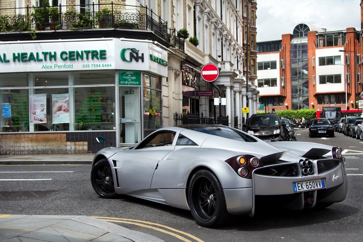 Silver Pagani on city street