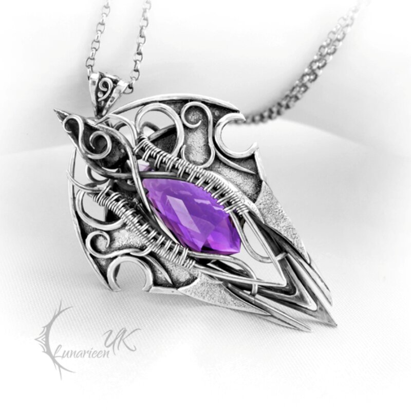 Silver Pendant with Purple Gem