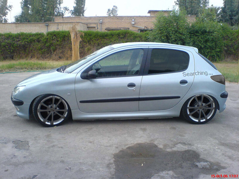 silver peugeot 206 car