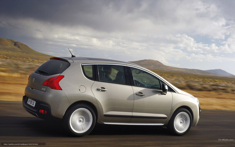 silver peugeot 3008 driving on road