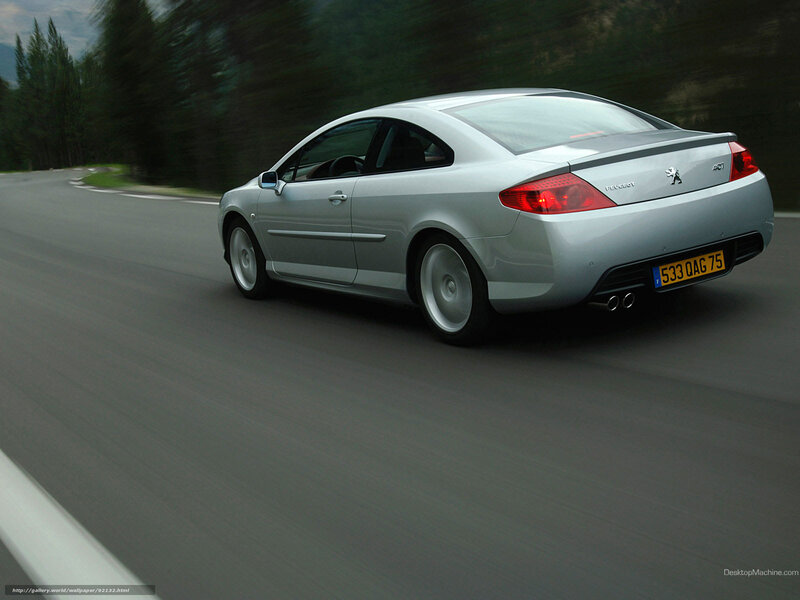 silver peugeot 407 coupe in motion