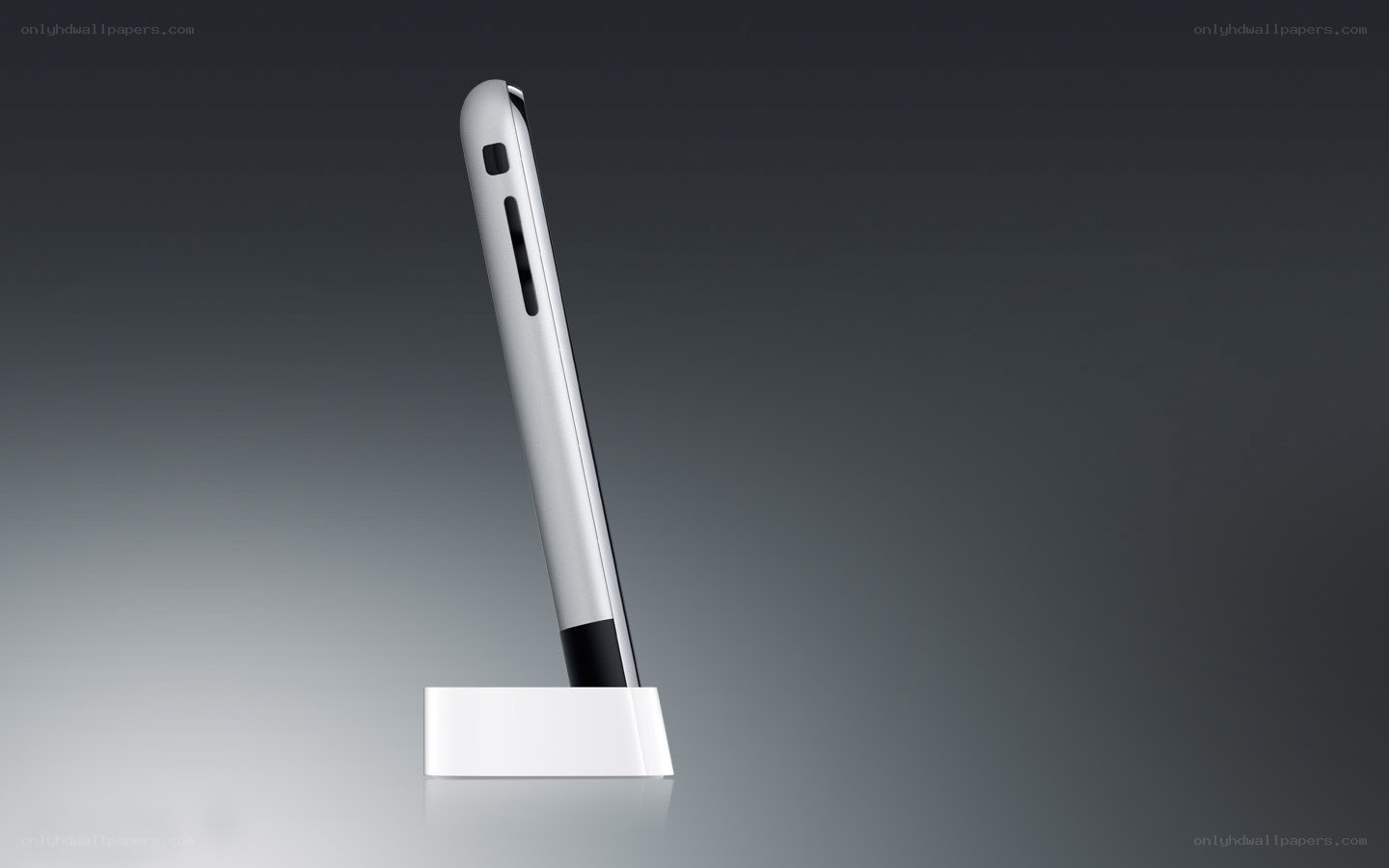 silver phone on white stand