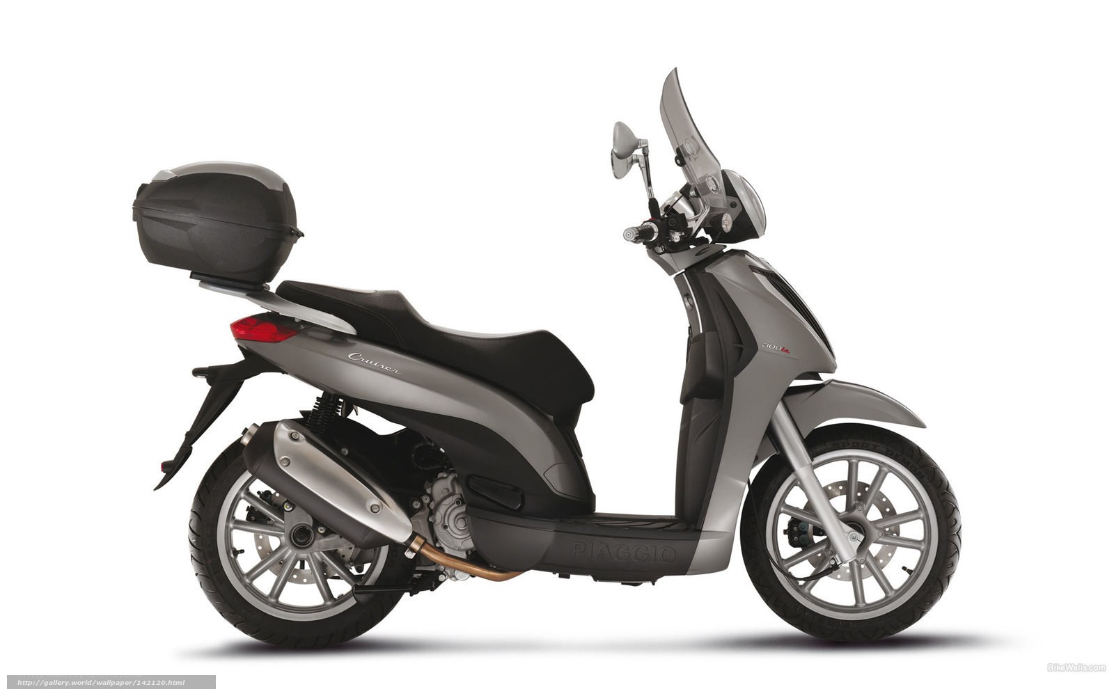 Silver Piaggio scooter with luggage