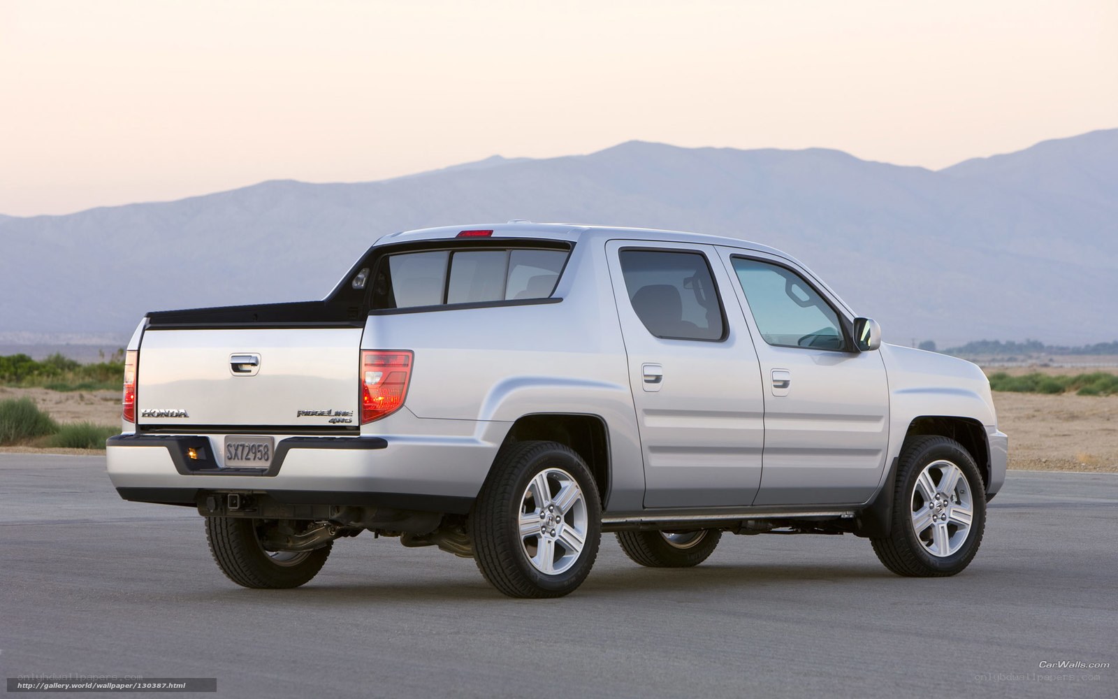 silver pickup truck in desert