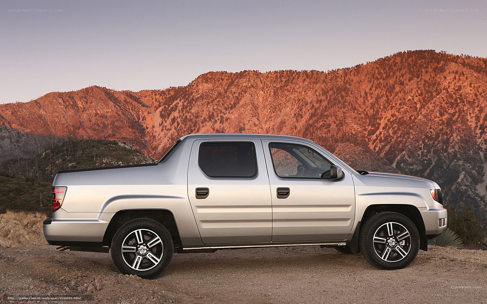 silver pickup truck in mountains