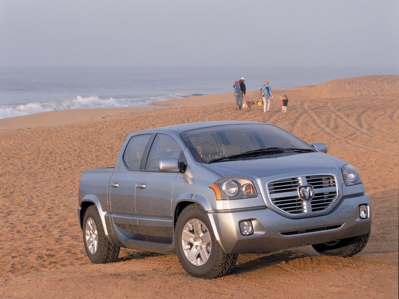 Silver pickup truck on beach