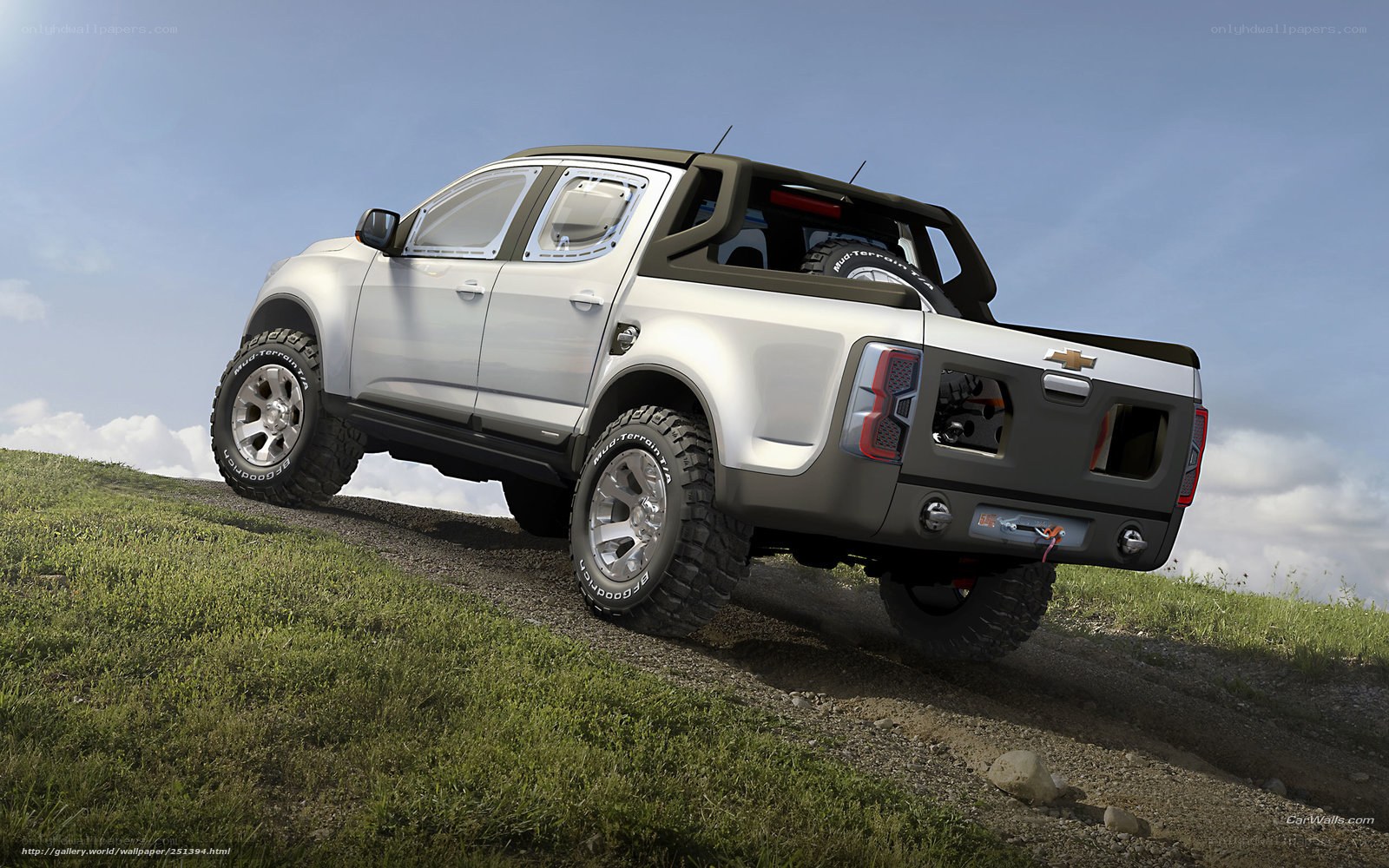 silver pickup truck on hill