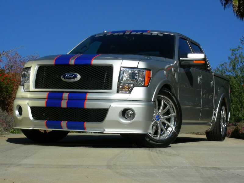 silver pickup truck with stripes