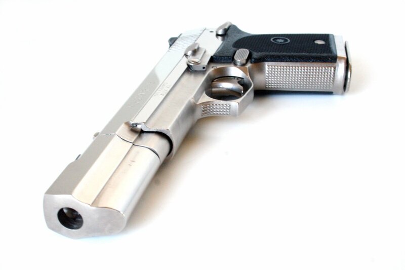 silver pistol with black grip