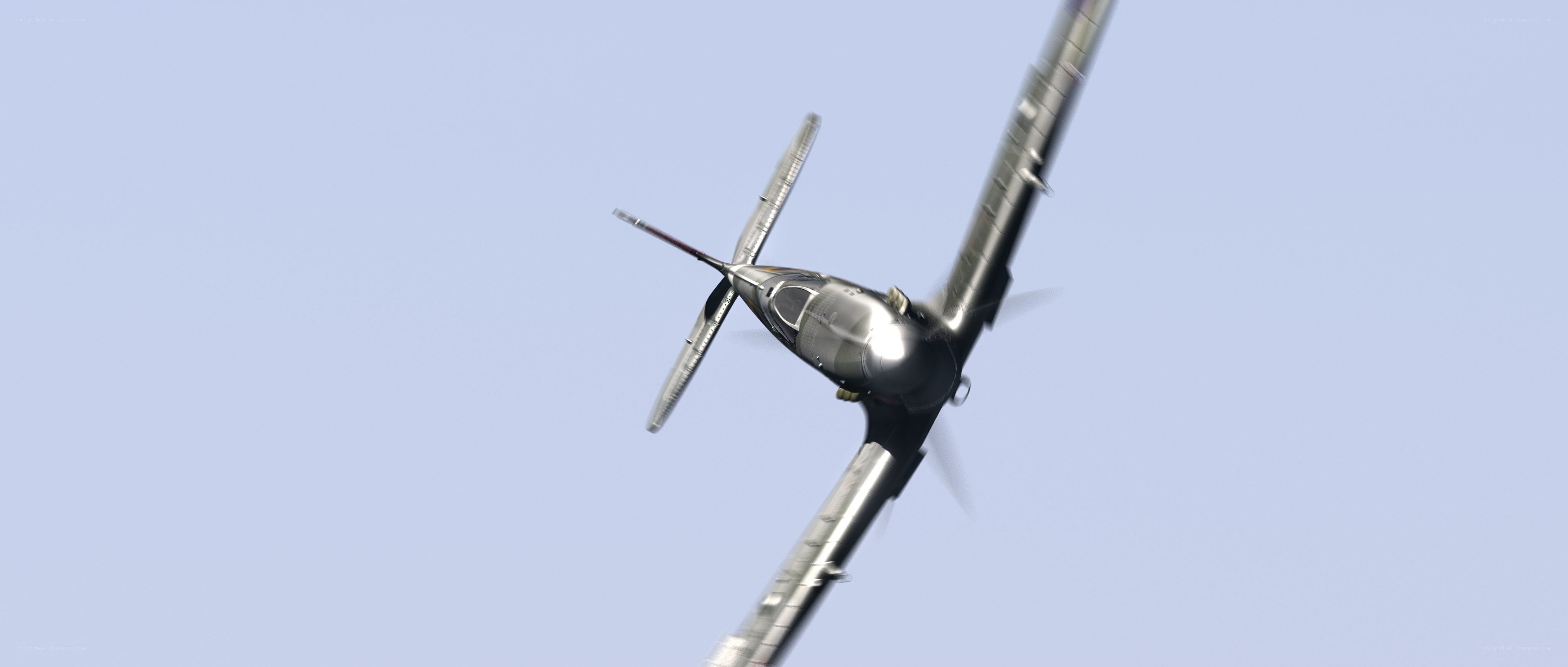 silver plane in flight