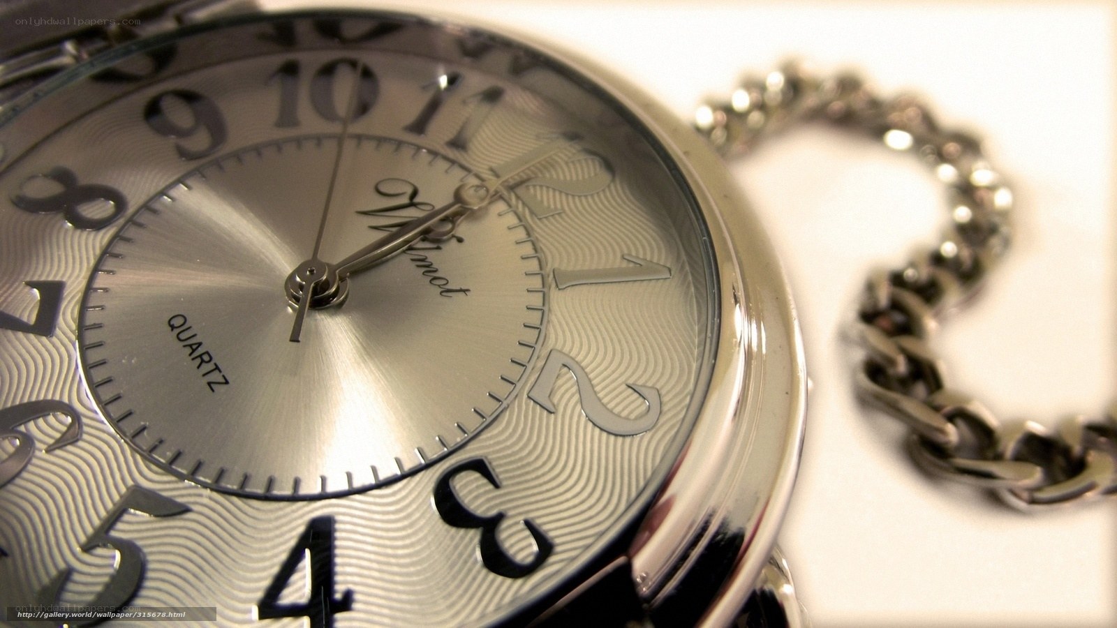 silver pocket watch close-up