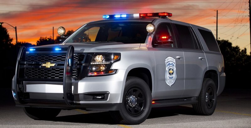 Silver Police SUV — Dramatic