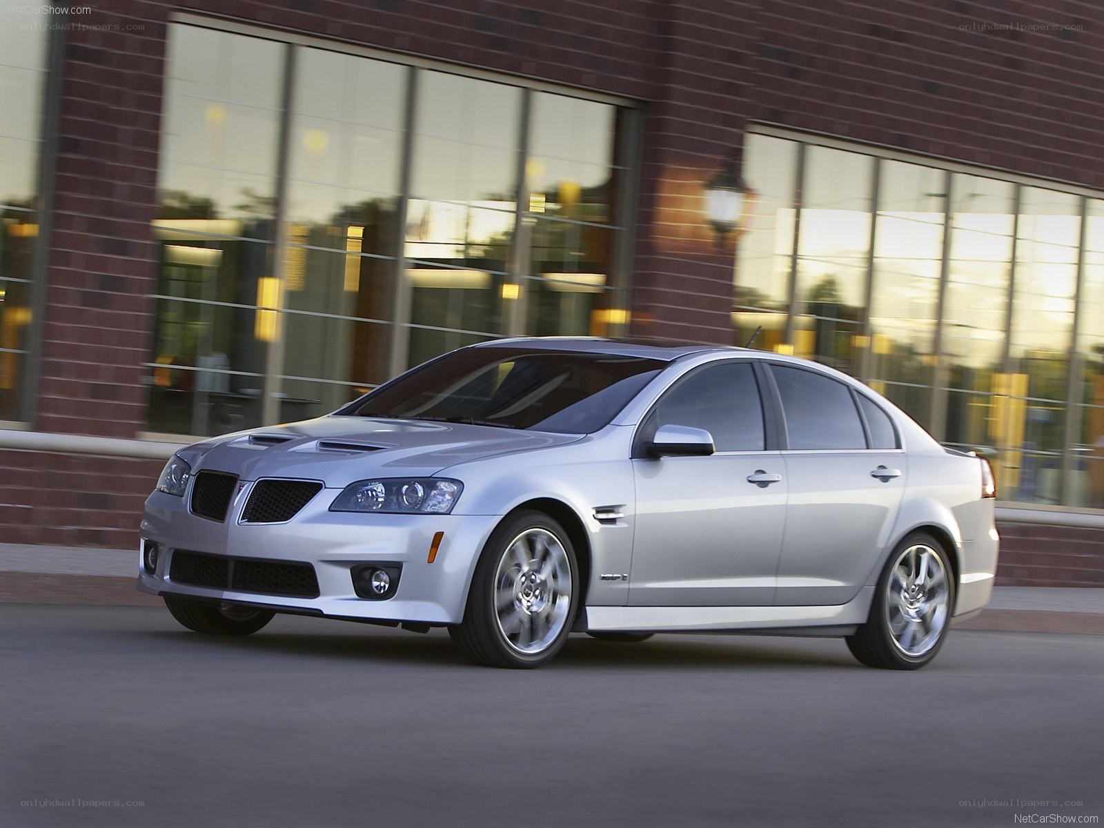 silver pontiac g8 in motion