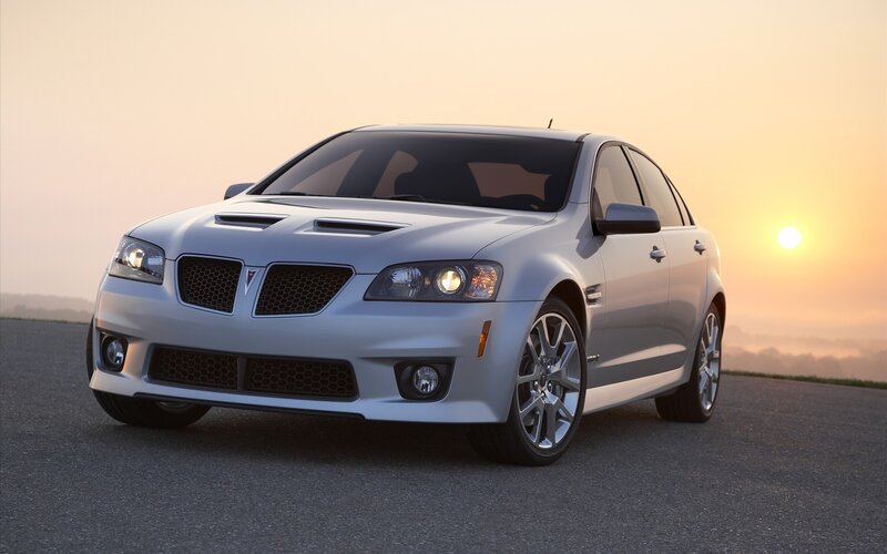 silver pontiac g8 in sunset