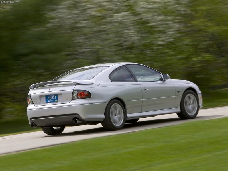 silver pontiac gto in motion