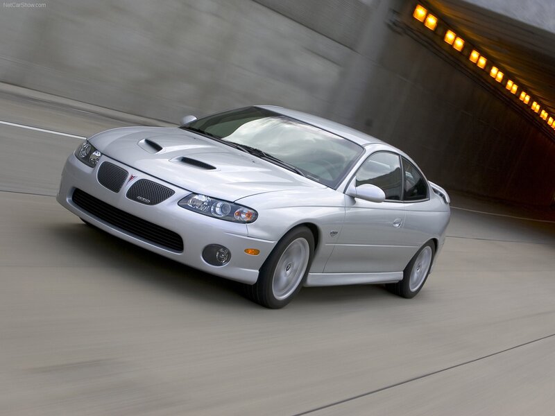 silver pontiac gto in tunnel