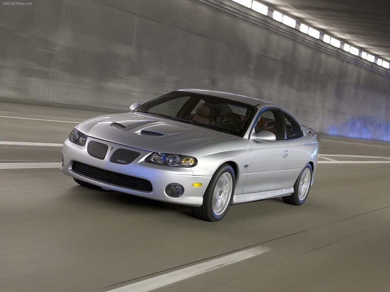silver pontiac gto in tunnel