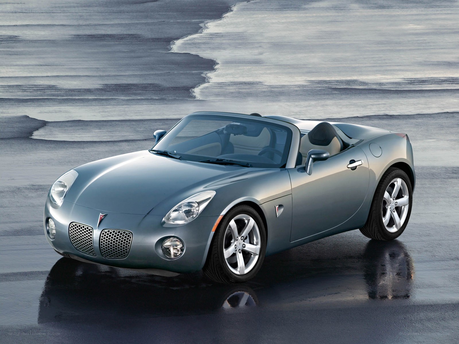 Silver Pontiac Solstice convertible