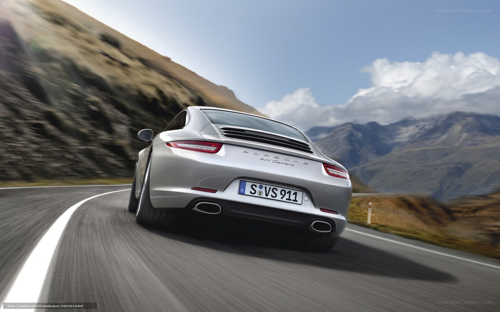 silver porsche 911 carrera driving