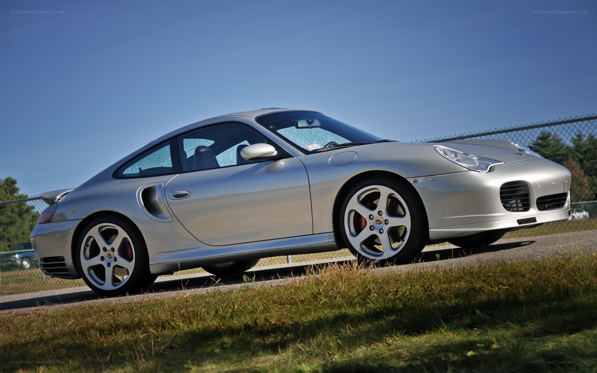 silver porsche 911 carrera rs