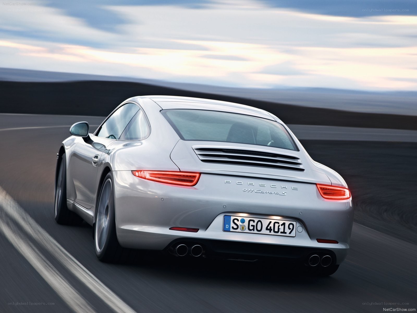 silver porsche 911 carrera s