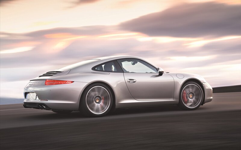 Silver Porsche 911 — Dramatic