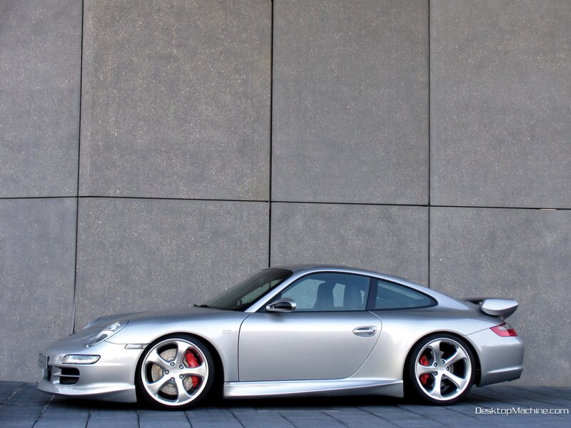 silver porsche 911 on concrete