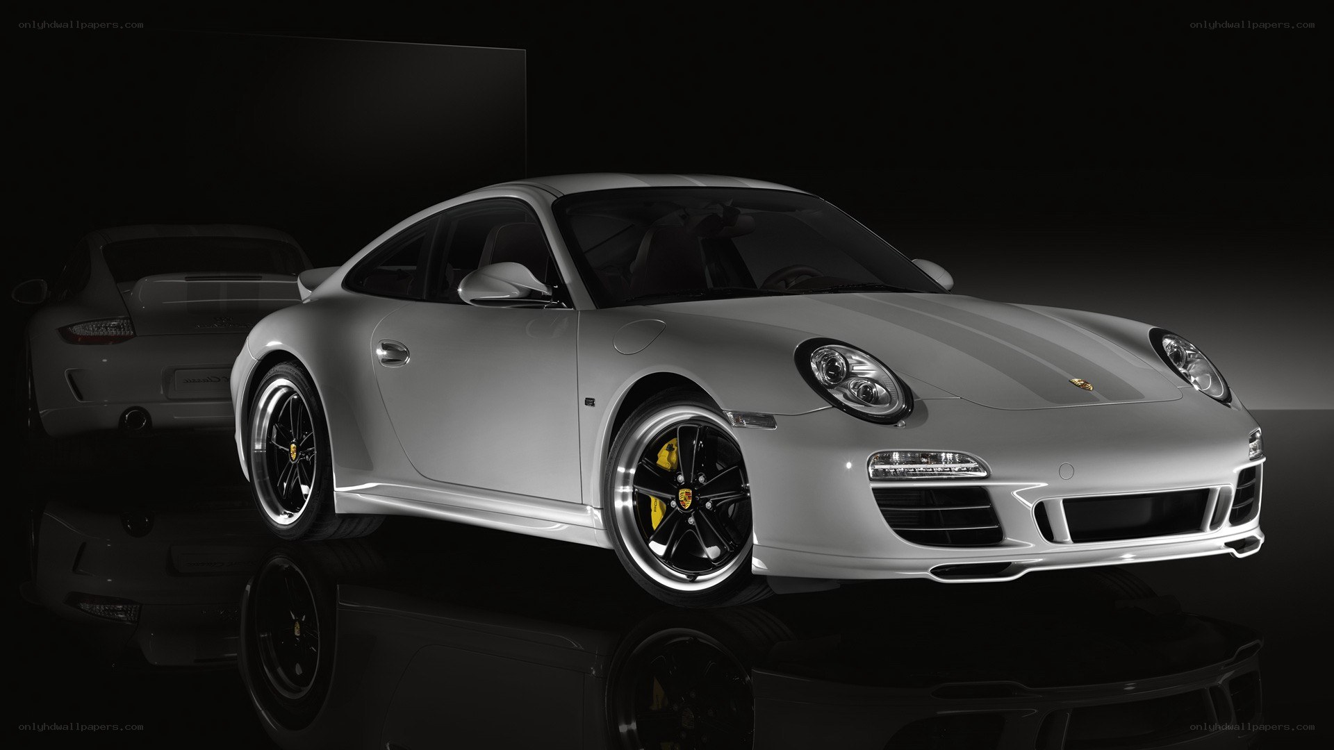silver porsche 911 on display