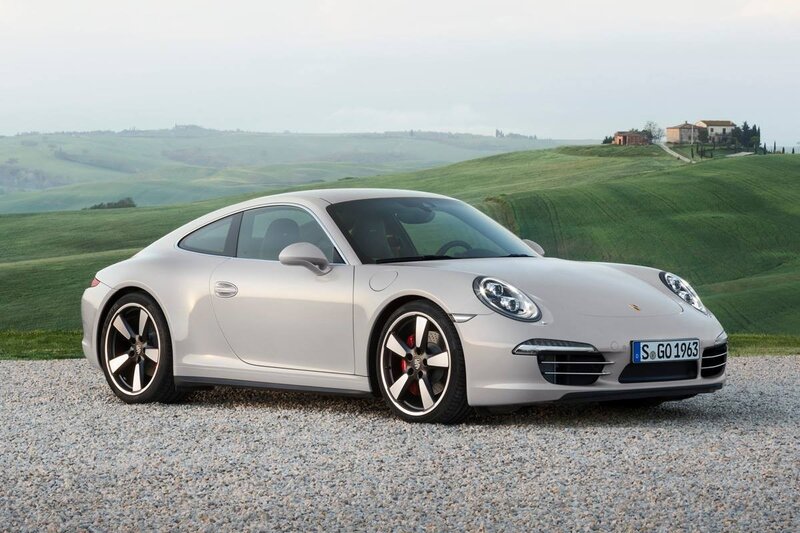 Silver Porsche 911 on gravel